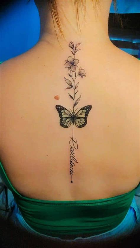 spine tattoos for women|vertical back tattoos for women.